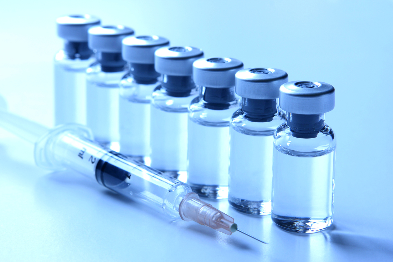 Medical Vials And A Syringe Vaccination Concepts Series